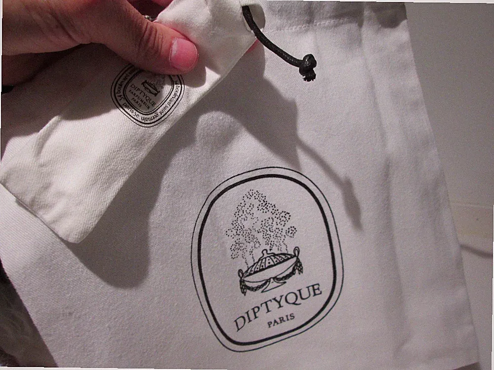 Diptyque Paris White logo with black drawstring pouches For protecting perfume